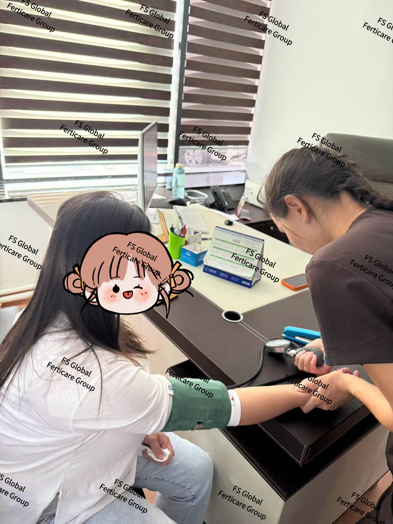 The first participant has her blood pressure measured in the consultation room.